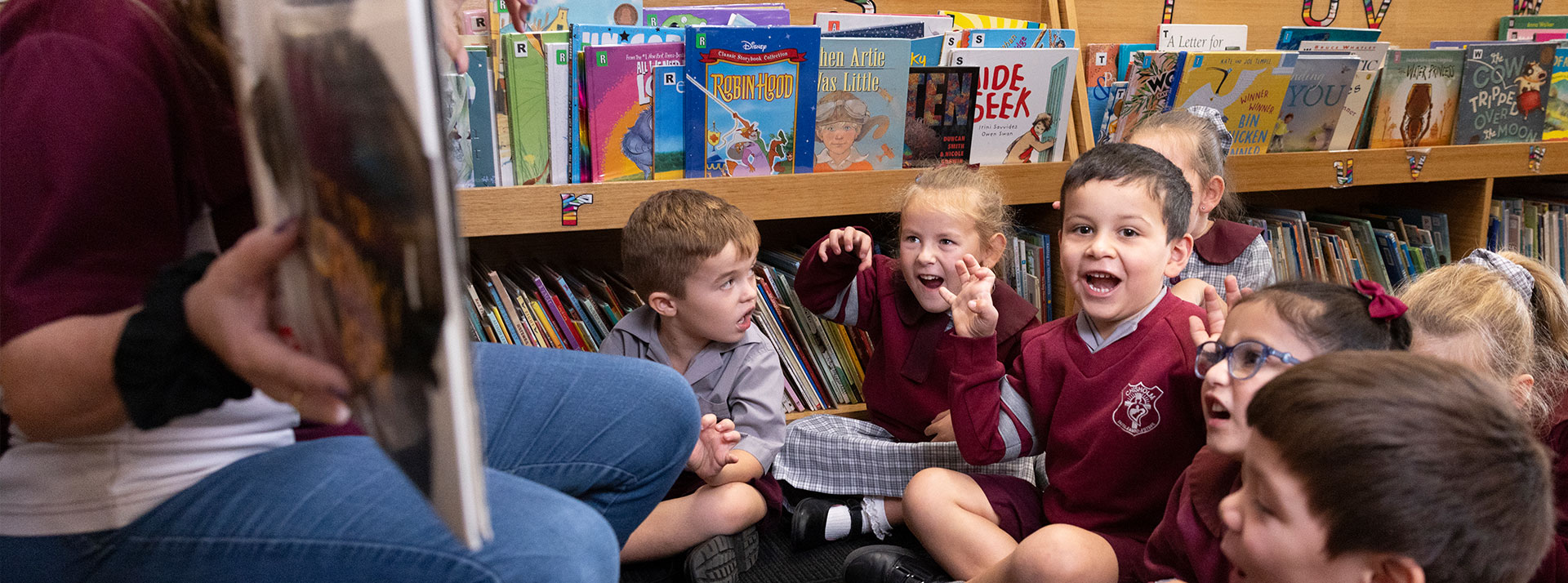 Librarian reading to students