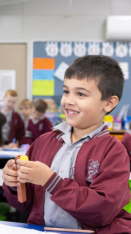 Smiling student learning math