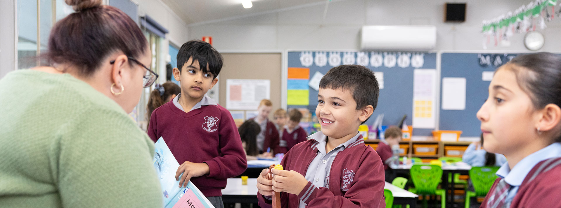 Smiling student learning math