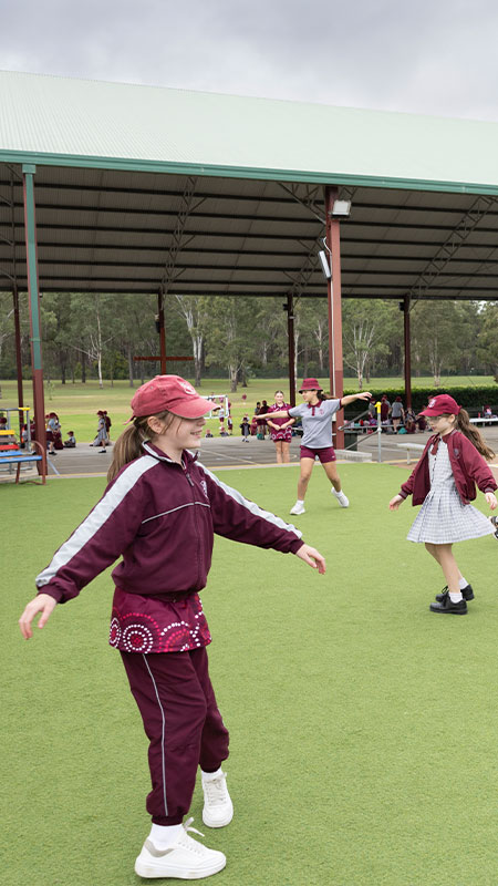 Chisholm Primary Bligh Park students playing on sports field