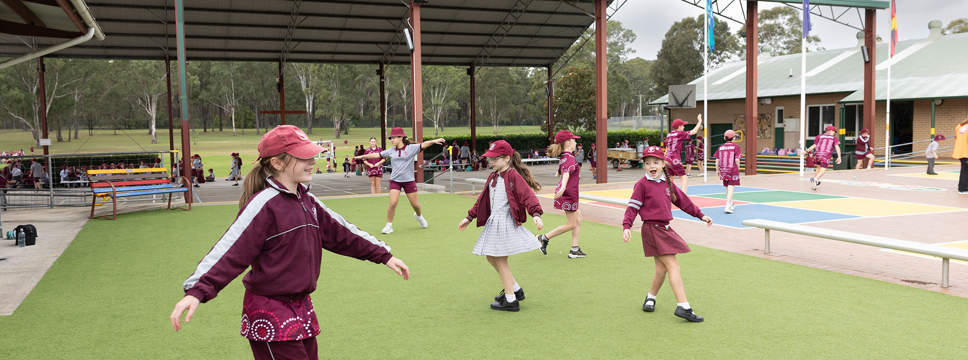 Chisholm Primary Bligh Park students playing on sports field