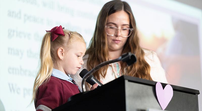 Chisholm Primary Bligh Park student speaking into microphone
