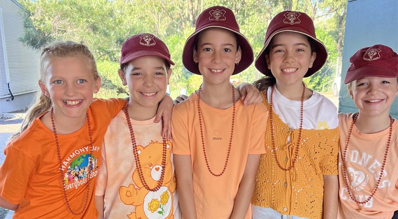 Children wearing Harmony Day shirts