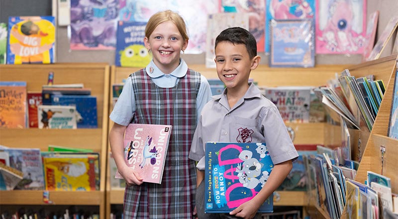 Two students in library